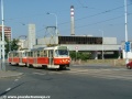 Souprava vozů T3R.P ev.č.8406+8407 vypravená na linku 12 opustila zastávku Nádraží Holešovice a s pozadím stanice metra se vydává k Ortenovu náměstí | 7.8.2004