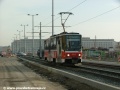 Vůz T6A5 ev.č.8612 vypravený na linku 15 uhání otevřenýhm svrškem okolo stadiónu Sparty k zastávce Hradčanská. | 21.11.2009