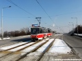 Souprava vozů T6A5 ev.č.8651+8623 vypravená na linku 24 klesá k zastávce Černokostelecká. | 12.2.2012
