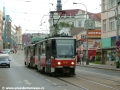 Souprava vozů T6A5 ev.č.8681+8682 vypravená na linku 4 míří Sokolovskou ulicí k zastávce Poliklinika Vysočany. | 26.7.2004
