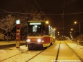 Vůz T6A5 ev.č.8701 vypravený na noční záložní vlak vozovnou Motol hradí spoj linky 57 v zastávce Říčanova. | 13.1.2004