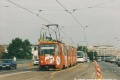 Vůz KT8D5 ev.č.9005 vypravený na linku X-B opatřený vkusnou celovozovou reklamou na limonádu Kofola přejíždí Hlávkův most | 21.9.2002