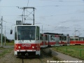 Vůz KT8D5 ev.č.9031 vypravený na linku 4 manipuluje na vnitřní koleji smyčky Sídliště Řepy. | 23.8.2004