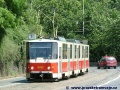 Před rekonstrukcí Chotkovy ulice byla trať vozům KT8D5 zapovězena, přesto se na ni občas podívaly, kuriózní situace nastala ve chvíli, kdy musela být do obratiště Špejchar z důvodu mimořádné události odkloněna linka 9 obsazená tehdy pouze vozy tohoto typu z důvodu ukončení linky 9 na kolejové přejezdu, což dokumentuje snímek vozu KT8D5 ev.č.9035 klesajícího Chotkovou ulicí. | 25.6.2004