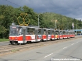 Souprava vozů KT8D5 #9042+9014 přepravovaná z vozovny Hloubětín do vozovny Motol pro provoz na lince 10 zachycená u zastávky Poštovka. | 9.9.2007