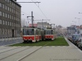 Souběžnou jízdou projíždí vozy KT8D5 ev.č.9046 a ev.č.9030 u zastávky Sazka arena zrekonstruovanou tramvajovou trať směr Balabenka