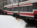 Vůz RT6N1 ev.č.9101 cestuje zimní krajinou na silničním tahači do šumperské firmy Pars Nova, a.s. k úpravě na typ RT6N2. | 21.1.2004