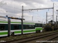 Vyřazený vůz RT6N1 ev.č.9102 v areálu DPOV, a.s. Nymburk ve společnosti lokomotivy 111.025 | 25.9.2009