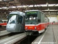Srovnání čel tramvají Škoda 14T ev.č.9111 a T6A5 ev.č.8615+8616 ve vozovně Motol. | 12.12.2005