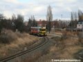 Lokomotiva 740 534-3 odváží do Plzně na železničních vozech tramvaj Škoda 14T ev.č.9111 | 9.2.2007