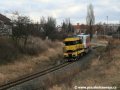Lokomotiva 740 534-3 odváží do Plzně na železničních vozech tramvaj Škoda 14T ev.č.9111 | 9.2.2007