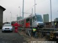 Vytahování vozu Škoda 14T ev.č.9119 na pražské koleje soupravou vozů T6A5 ev.č.8605+8606 pokračuje centimetr po centimetru. | 16.2.2007