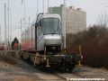 Lokomotiva 740 469-2 a vůz Škoda 14T ev.č.9121 ložený na třech plošinových vozech u rampy předávací koleje na nádraží Praha-Zličín. | 5.3.2007