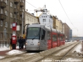 Během sněhové kalamity stanicuje v zastávce Divadlo Gong vůz Škoda 14T ev.č.9126 vypravený na linku 12. | 5.12.2010