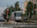 Vůz Škoda 14T ev.č.9154 vypravený na linku 20 dobrzďuje do zastávky Malý Břevnov. | 31.8.2010