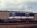 Na železničním nádraží ve Zličíně čekají dva vozy RT8D5M rozložené na jednotlivé články na svůj transport na železničních vozech; zadní článek. | 22.5.1998
