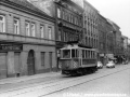 Dvounápravový kolejový brus #4091 stoupá poblíž zastávky U Zvonu Plzeňskou ulicí. | 31.8.1977