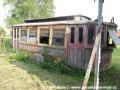 Bývalý vlečný vůz DP Praha ev.č.720 využívá TJ Sokol Hořany jako sklad. | 17.6.2006