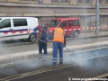 Pokládka první vrstvy asfaltového zákrytu. | 12.3.2012